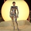 Zendaya at premiere standing in sand wearing metallic robot suit